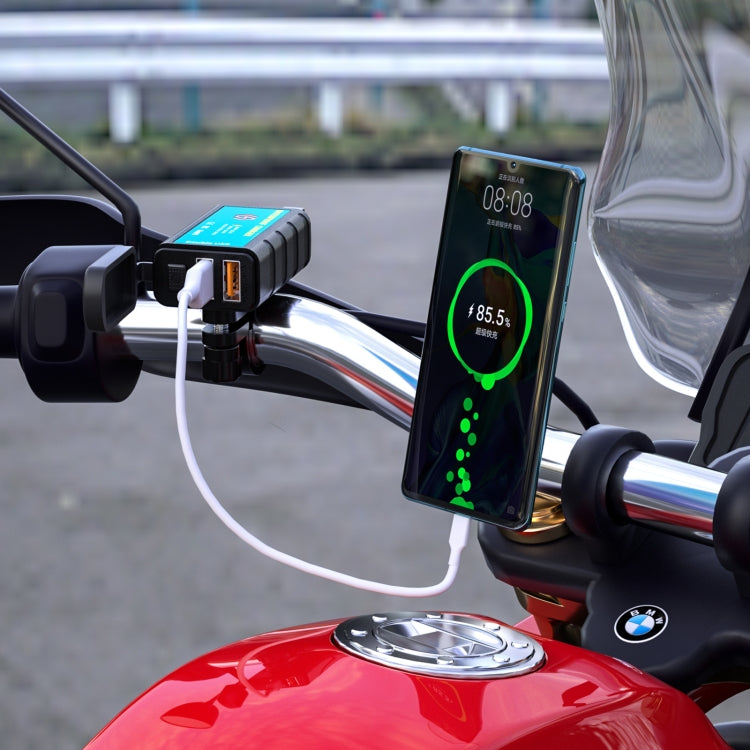Motorcycle dual USB charger connected to a phone showing charge level