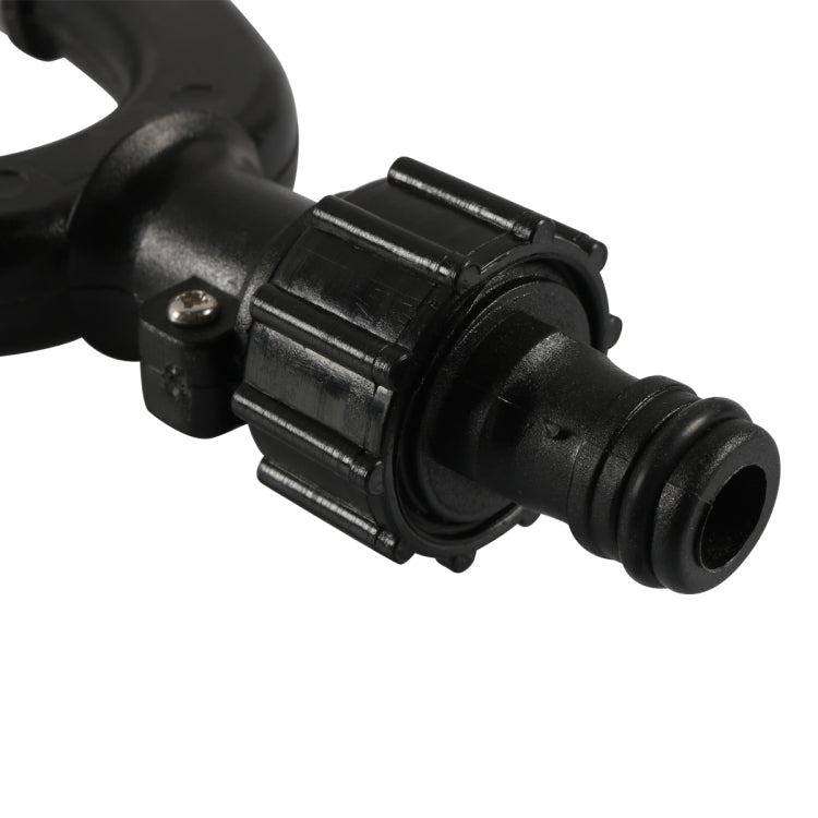 Black motor cleaner tool close-up of reinforced tube connector and hose outlet