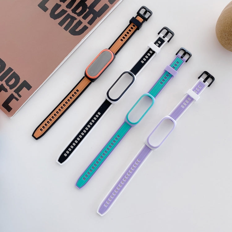 Set of four two-tone silicone smartwatch wristbands: orange, black, blue, and purple
