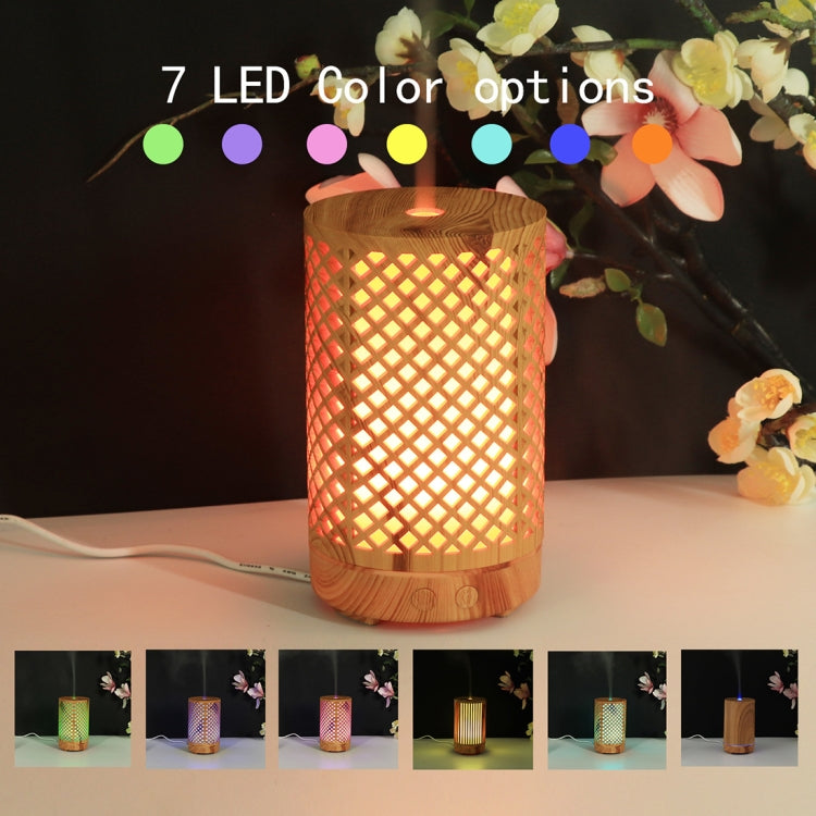 Wooden ultrasonic essential oil humidifier with geometric cutout and warm LED light