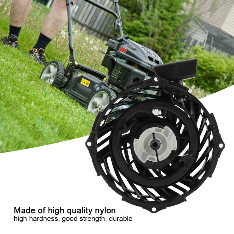 Recoil pull starter assembly with black fan housing and white starter pulley, starter handle
