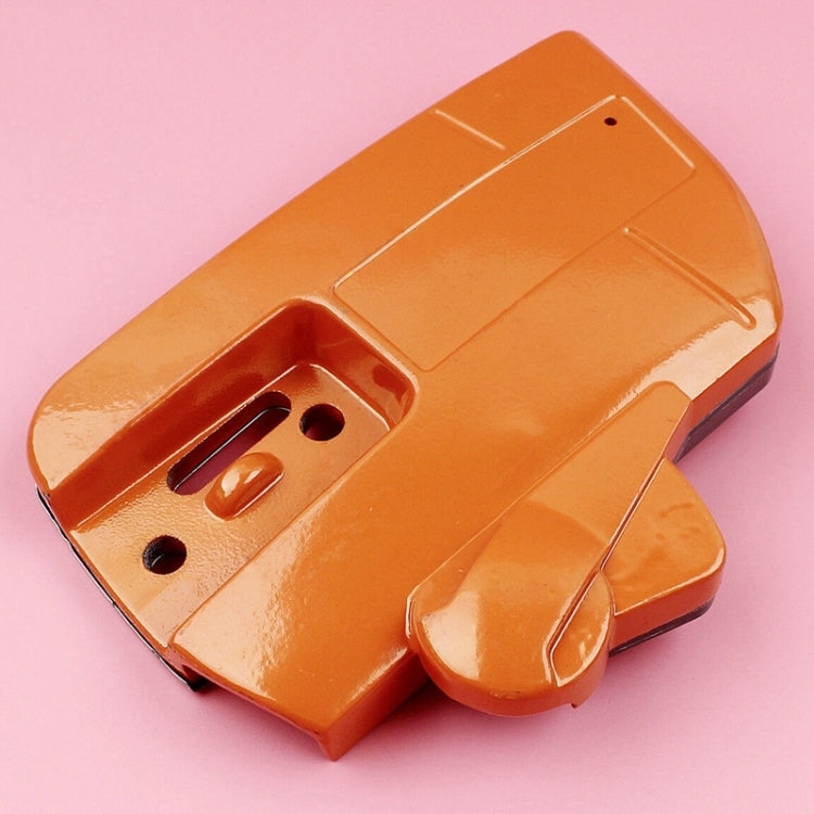Orange clutch cover housing underside with rectangular slot and mounting holes