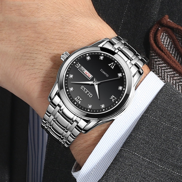 Men's OLEVS quartz watch on wrist, black dial with Roman numerals and date window.
