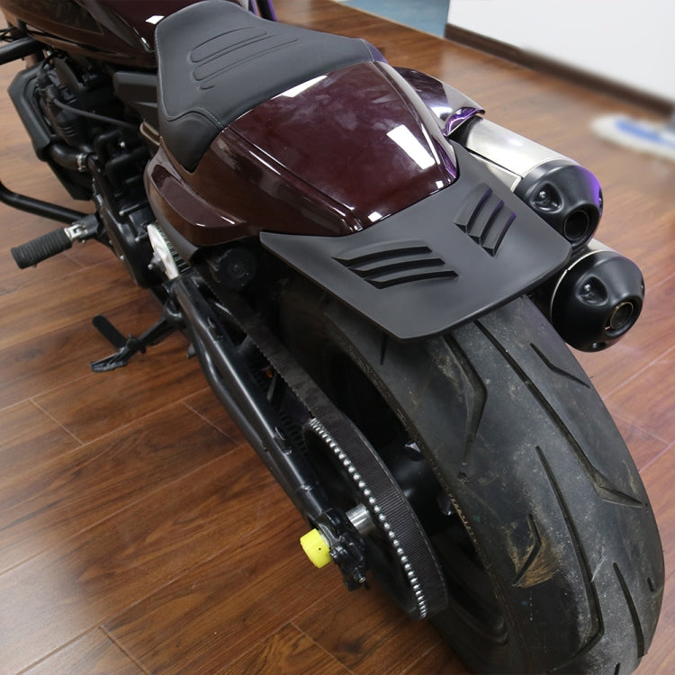 Black rear wheel fender installed on motorcycle, showing side vents and bracket
