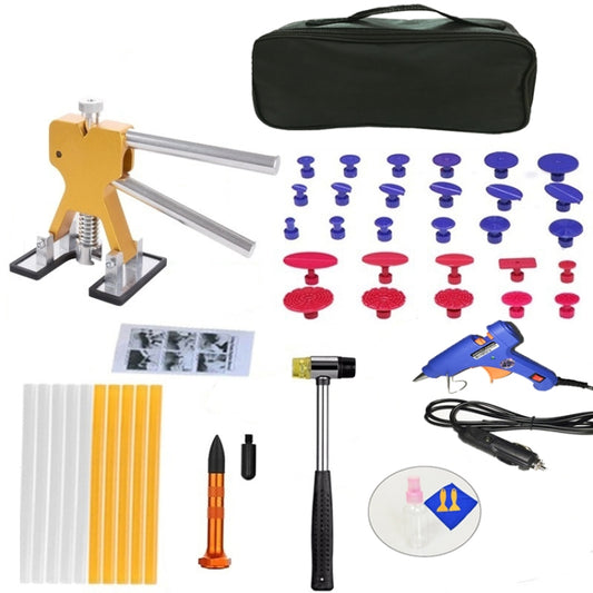 Car dent puller kit with slide hammer, hot glue gun, and assorted glue tabs
