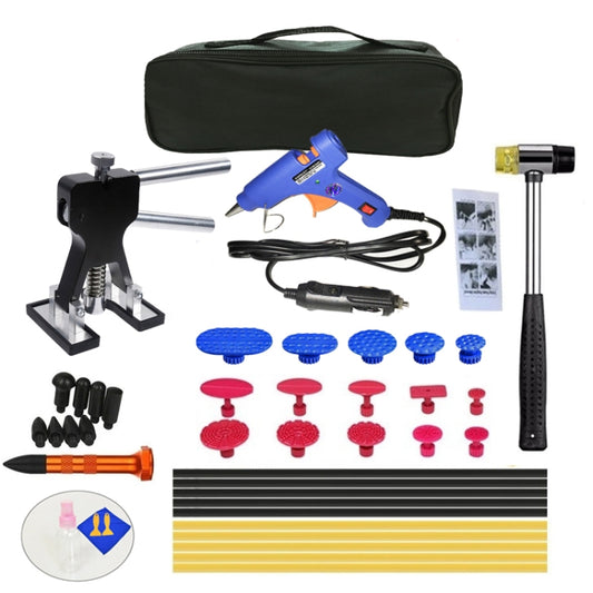 Car dent repair tool kit with glue gun, puller, suction tabs, cords, and storage bag