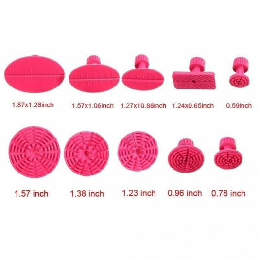 Set of pink suction puller discs in multiple sizes for dent repair