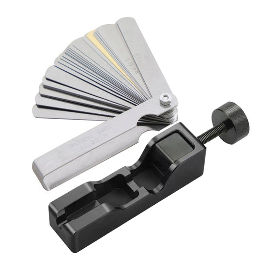 Spark plug gap tool with silver feeler gauge blades and black clamp body