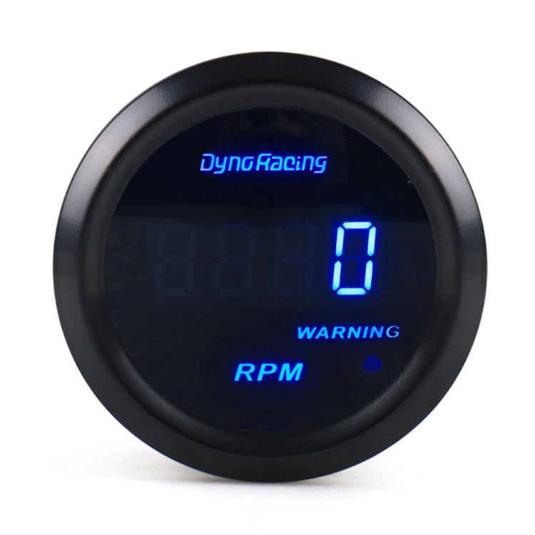 Round tachometer gauge with blue digital RPM display and WARNING text