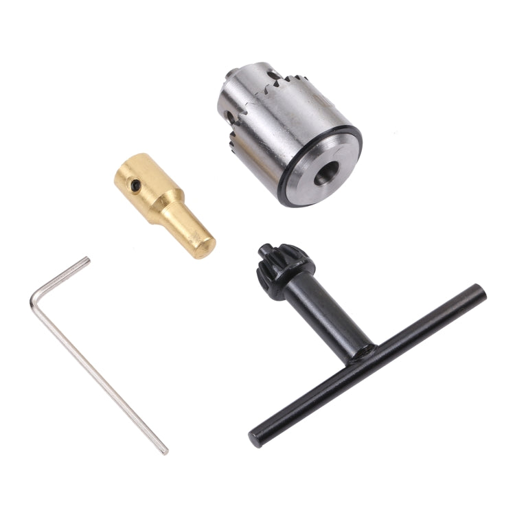 Silver drill chuck with gold adapter, black handle, and hex wrenches