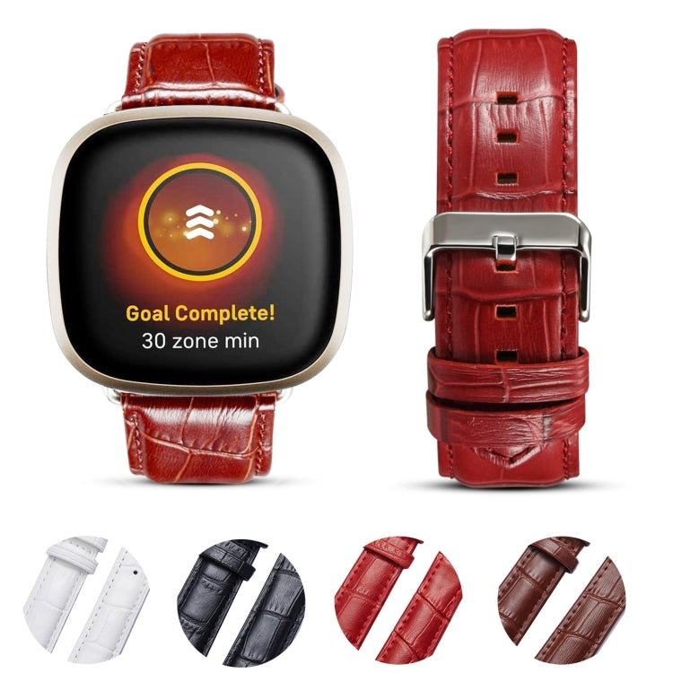 Red crocodile-texture leather watch band with steel buckle on smartwatch; assorted bands
