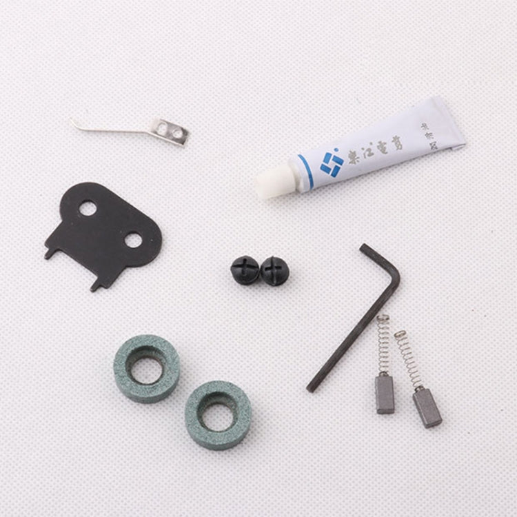 Accessory parts for electric fabric cutter: screws, washers, Allen key and lubricant tube