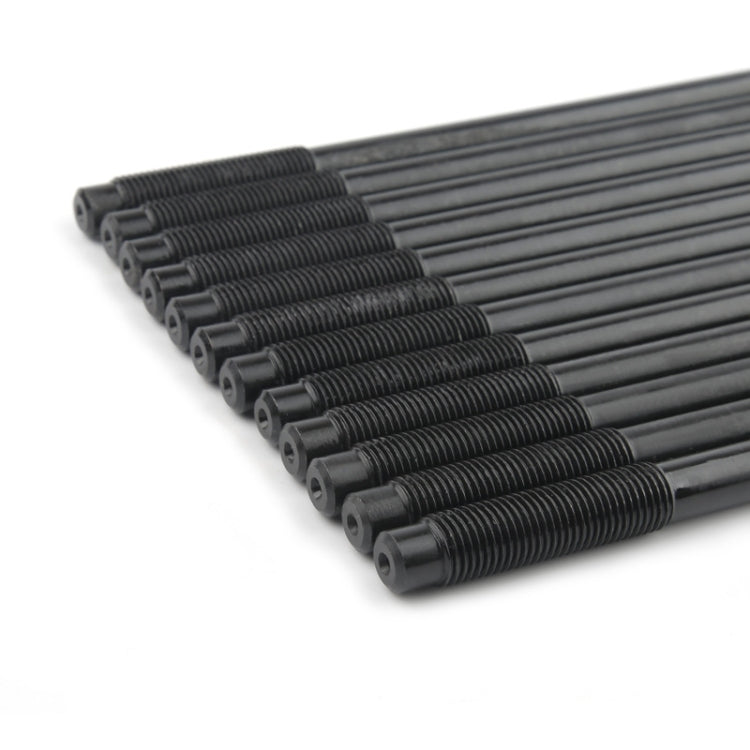 Cylinder head stud kit close-up of black threaded studs with hex-shaped ends