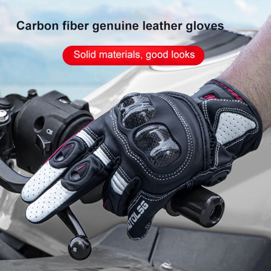 Motorcycle leather gloves close-up with raised knuckle armor, perforated black palm and red trim