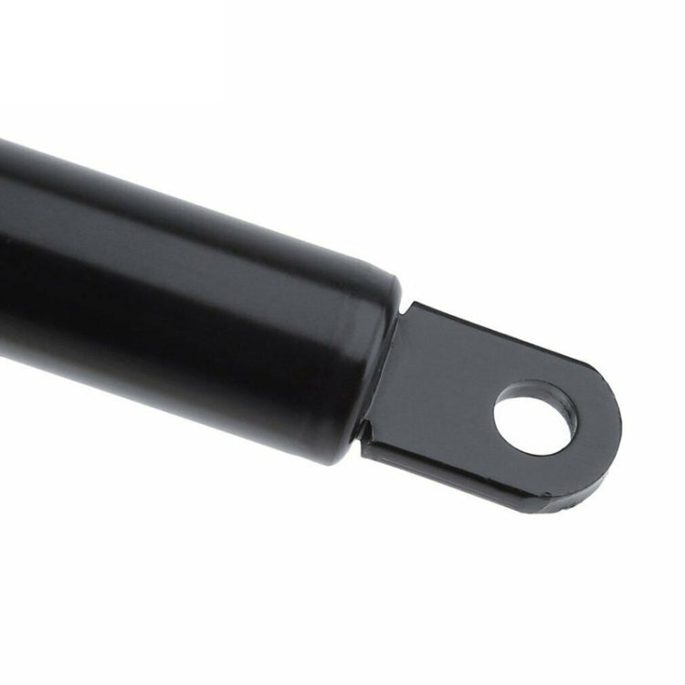 Gas spring strut eyelet mount on black cylinder with circular hole bracket