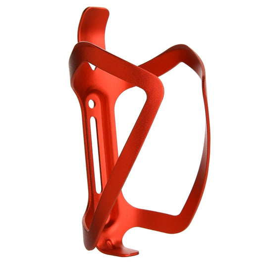Red aluminum bicycle water bottle cage holder with oval cutout and mounting slots.
