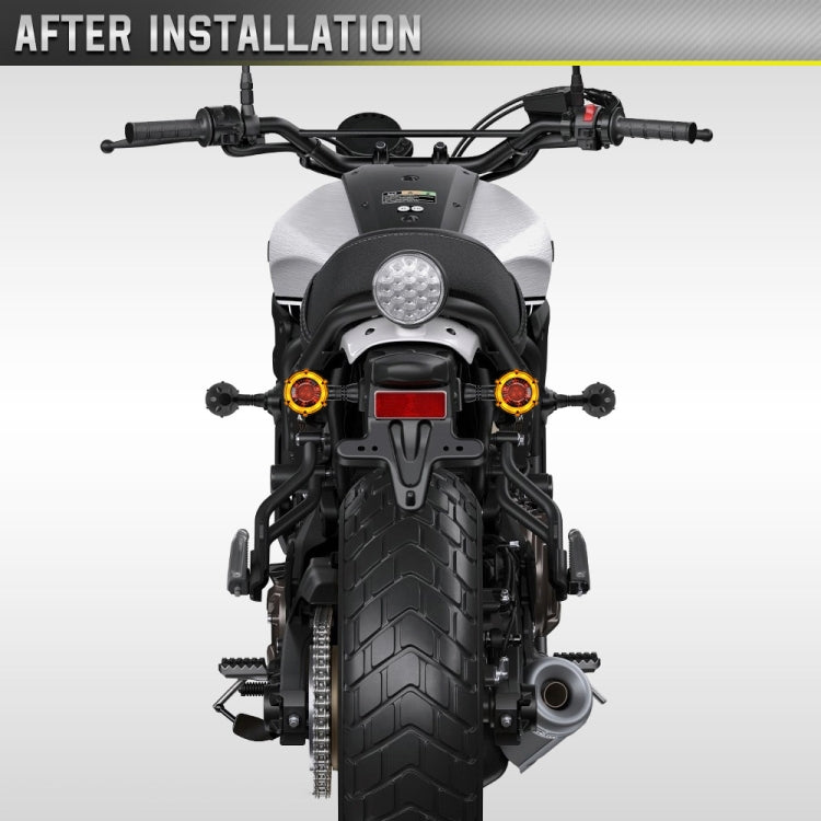 Motorcycle LED turn signals, two amber circular lights on front of motorcycle