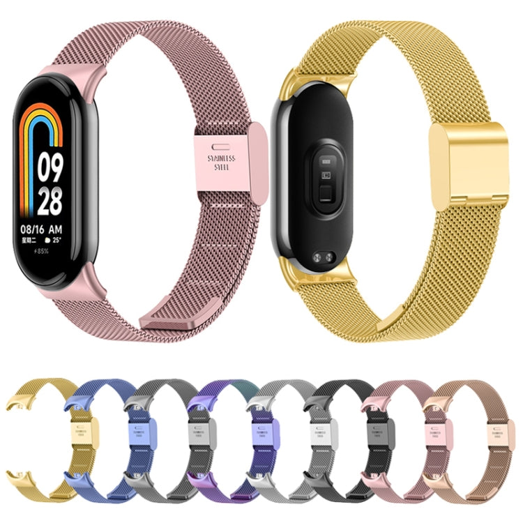 Milanese metal watch bands in pink and gold, with clasps and black fitness watches