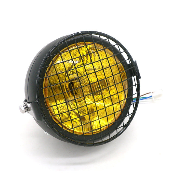 Motorcycle retro LED headlight with black housing, wire mesh guard, yellow lens light
