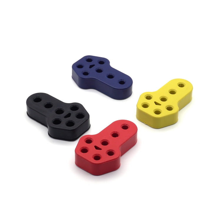 Set of car exhaust hanger bushings in red, yellow, black, and blue, rubber pieces