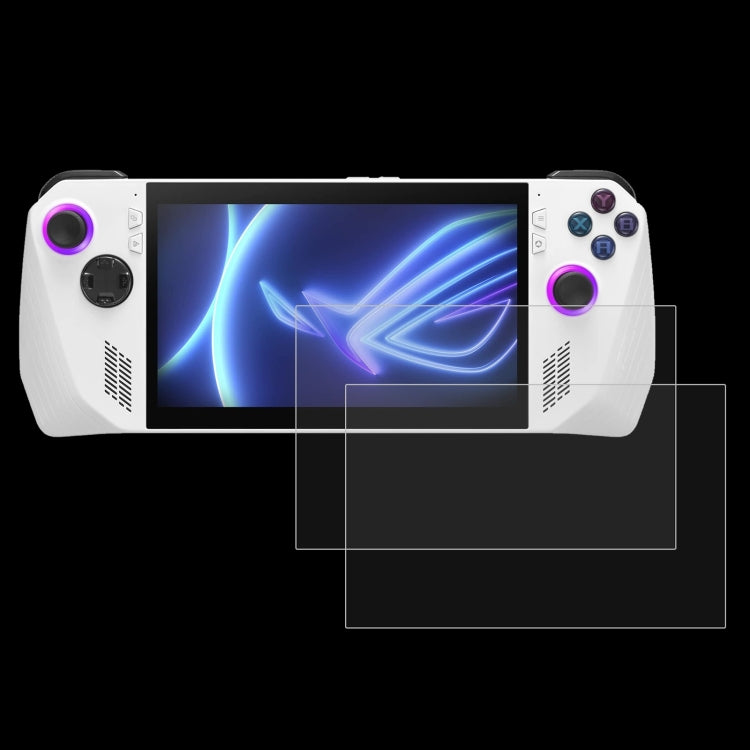 Tempered glass screen protector film on handheld gaming device, includes extra sheets