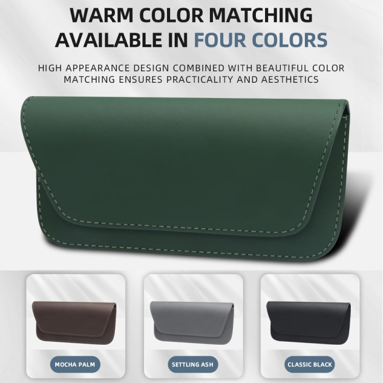 Car glasses storage bag in dark green leather with contrast-stitched front flap
