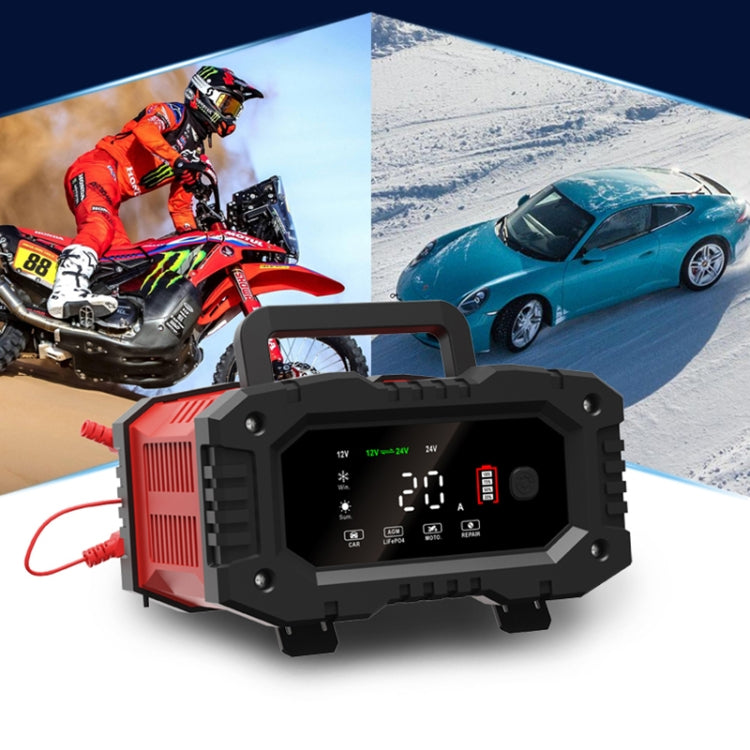 Portable battery charger with red battery clamps and digital screen showing charging