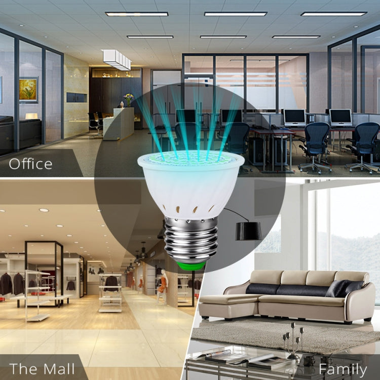 UVC sterilization lamp bulb in an office-style room with light rays effect