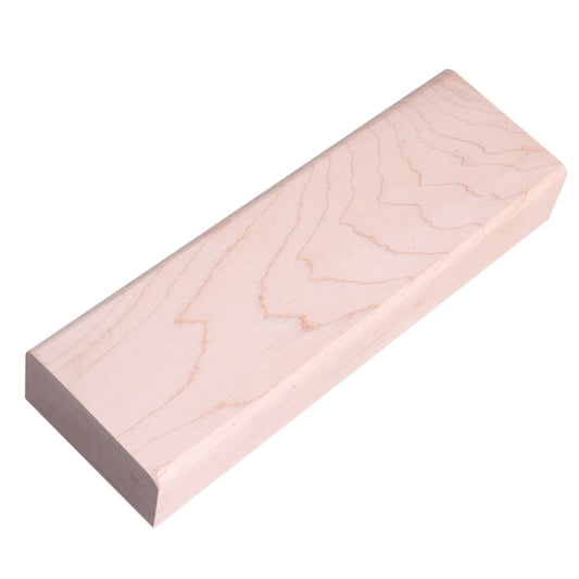 Wooden block with metal sanding strip for trimming guitar fret edges