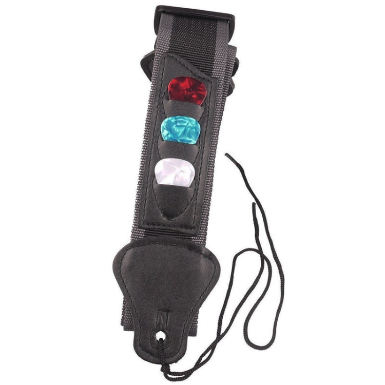 Black guitar strap end with pick display: red, blue, and white picks