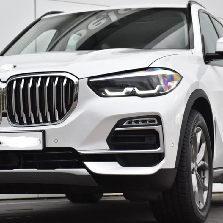 Vehicle LED headlight with daytime running light on white SUV front