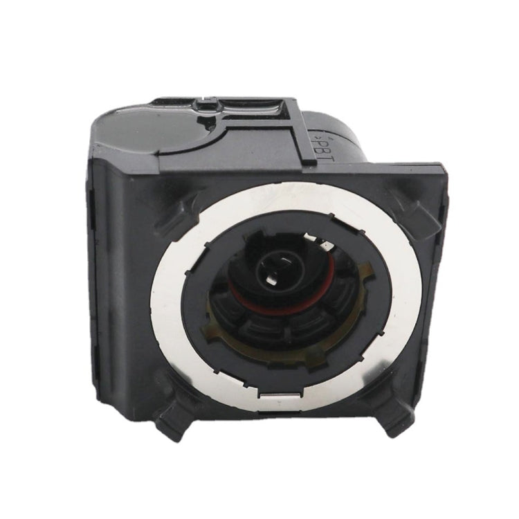 Black xenon igniter module with circular opening and top connector tab