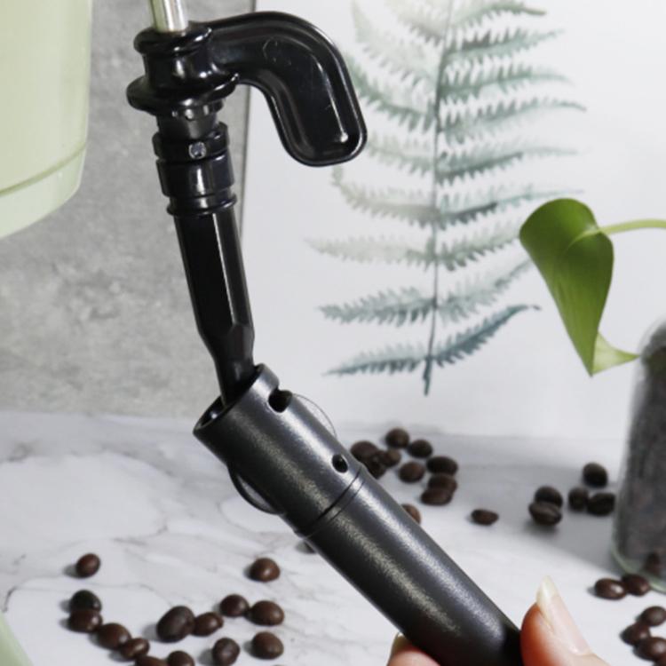 Black plastic steam nozzle tube attached to coffee machine steam arm