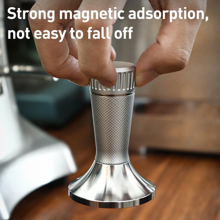 Stainless steel coffee powder pressing tool with fine mesh, held in hands