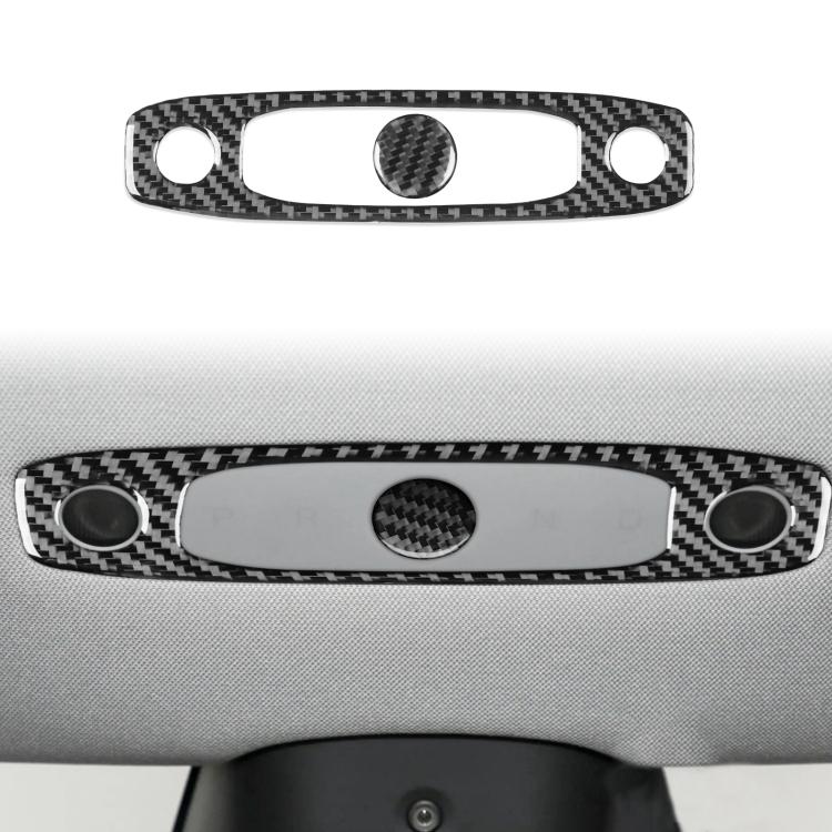 Black carbon fiber reading light panel trim sticker on car interior with oval center