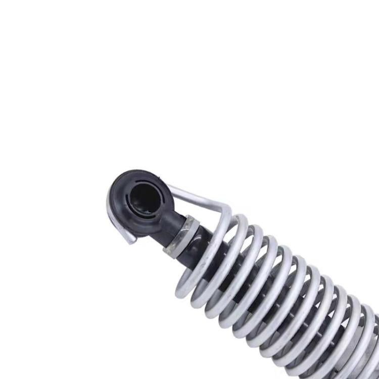Trunk spring support rod close-up, black rubber bushing and chrome coil spring
