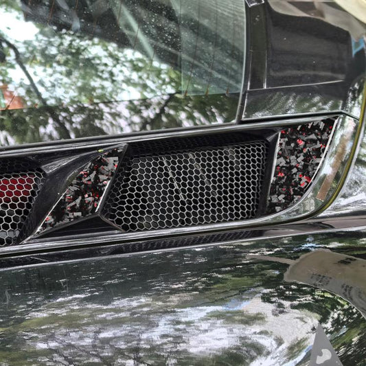Engine side vent sticker set on car grille, black carbon-fiber with red foil accents