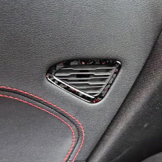 Door air outlet trim sticker set with carbon-fiber look and red speckle surround