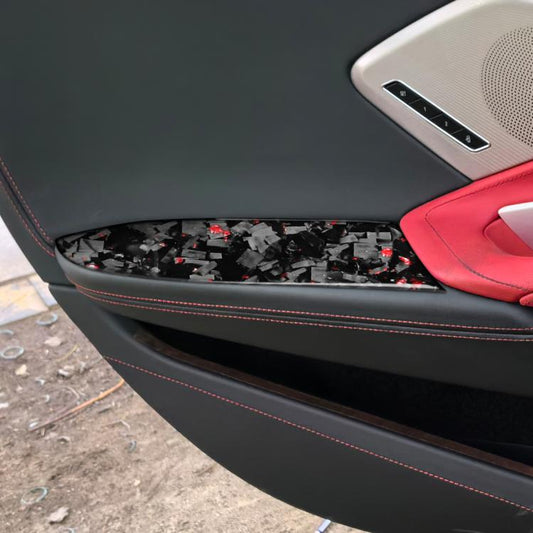 Black carbon-fiber armrest panel stickers with red accents on inner door armrest