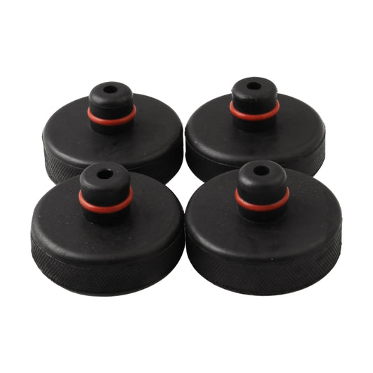 Four black rubber car jack pads with red O-ring inserts