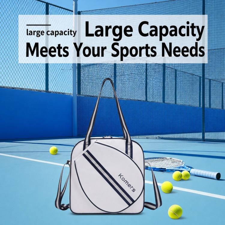 Komers large-capacity tennis bag in white with navy stripe, with tennis balls nearby.