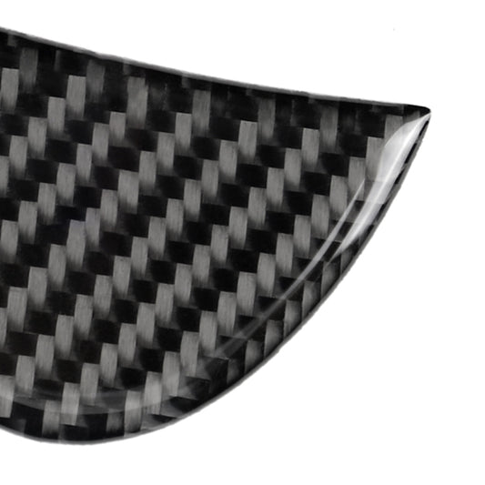 Triangular carbon fiber sticker detail, glossy weave texture with silver edges