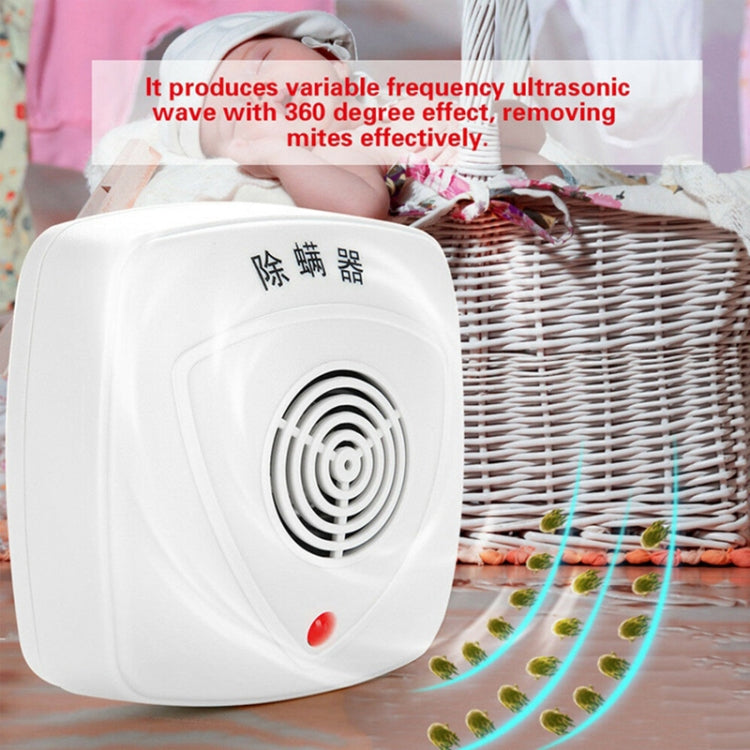 Ultrasonic mite control device on bedding with speaker grille and red indicator light