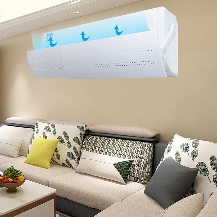 Air conditioner wind deflector shroud mounted above sofa, white vented panel
