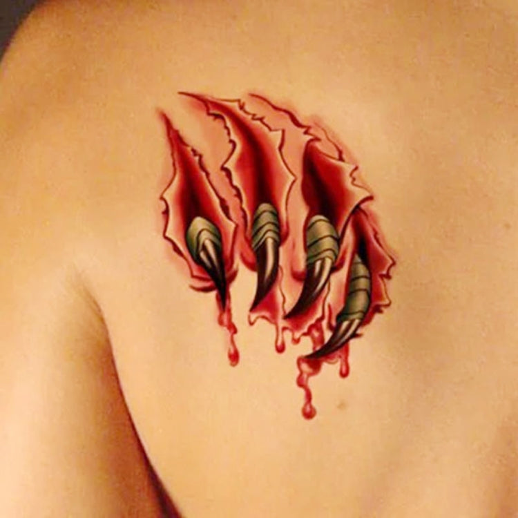 Temporary wound scar tattoo on skin: red burn marks with green veins and dripping blood