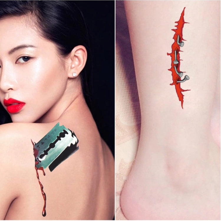 Temporary blood wound and scar tattoo stickers on skin near shoulder and arm