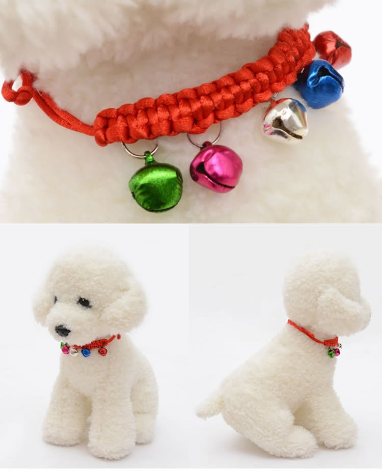 Adjustable woven pet bell collar on small white plush dog, red cord with green, pink, blue bells