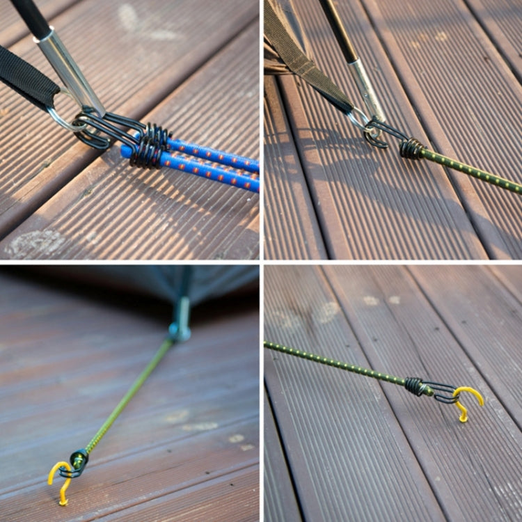 Elastic tent tie rope detail, blue and green braided lines with metal S hooks