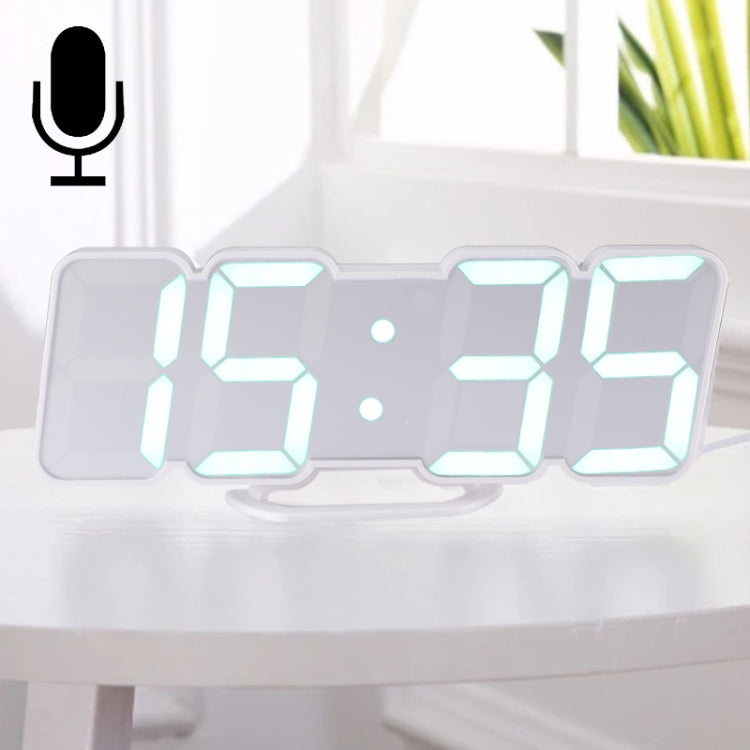 Close-up LED alarm clock display with glowing turquoise digits and microphone icon