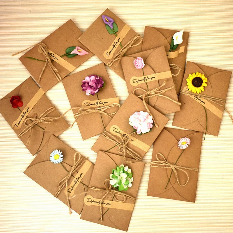 Set of 10 kraft greeting cards with different dry flowers, each tied with twine